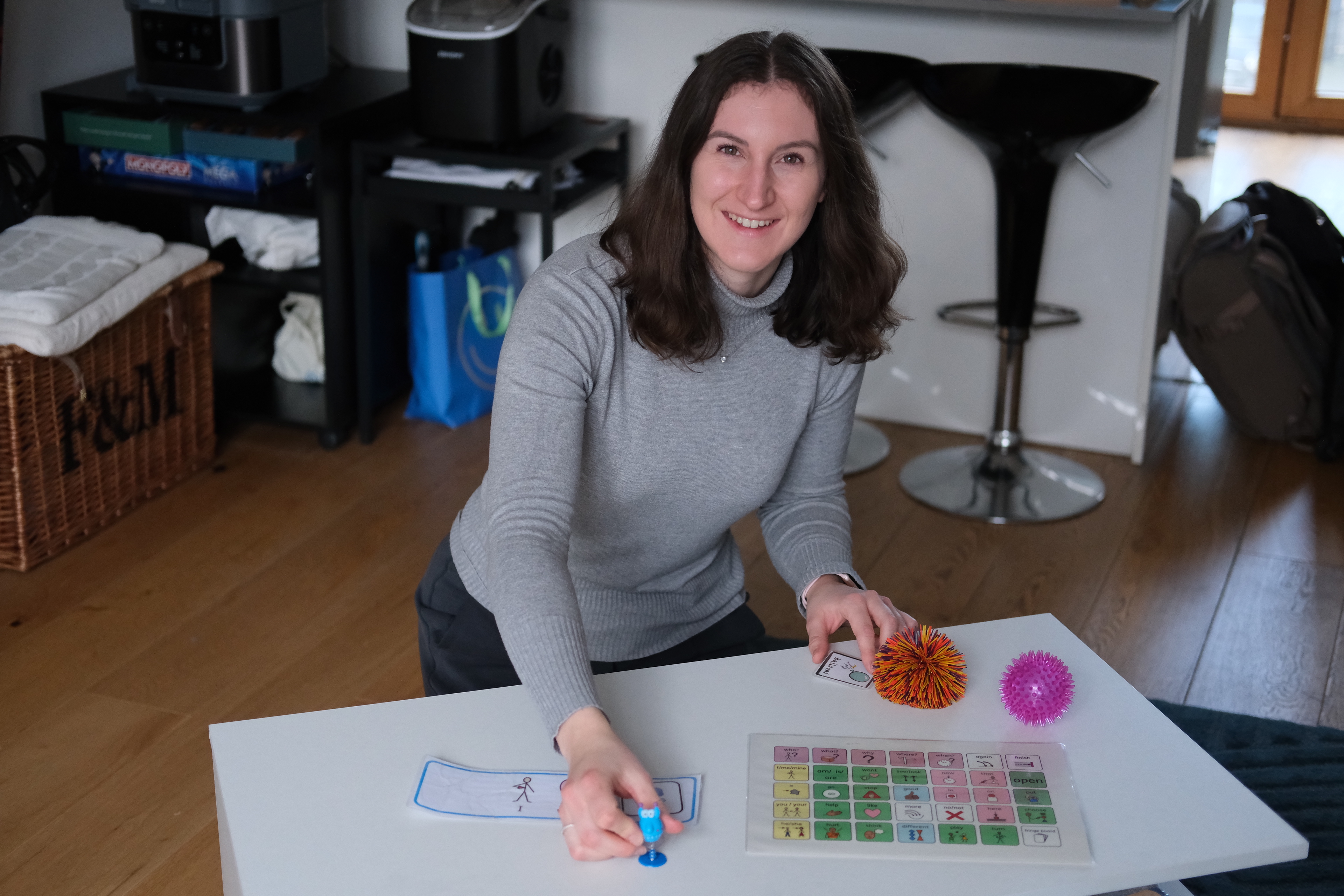 Nina, speech and language therapist, working with communication materials